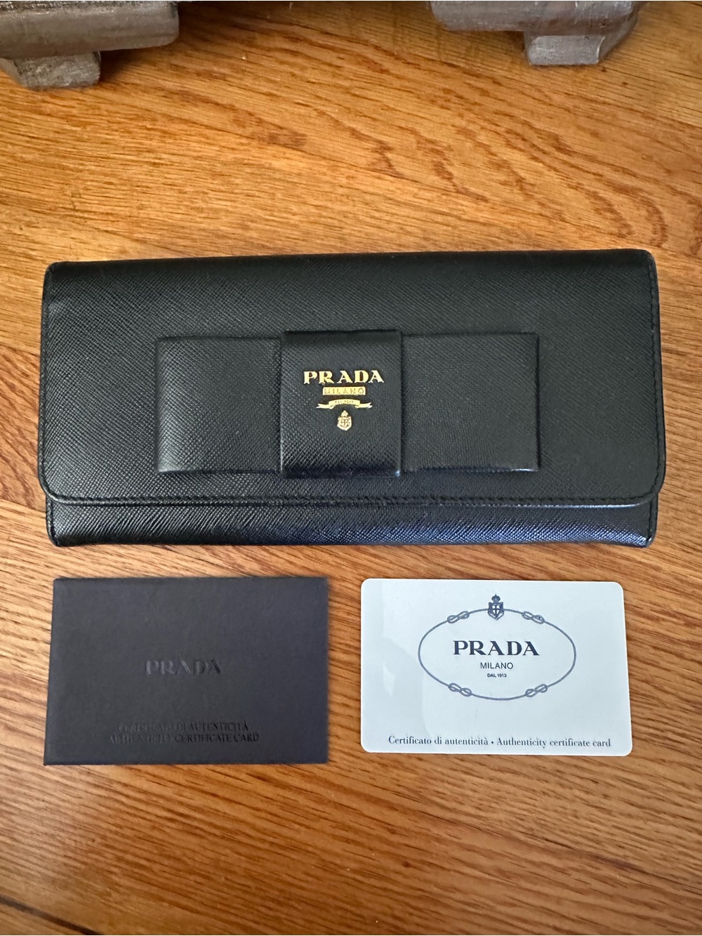 Prada Black Saffiano Leather Bow Continental Wallet with Gold Logo